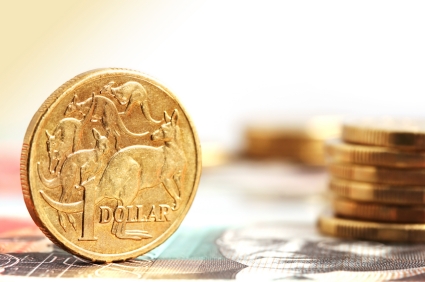 Aussie one dollar coins, on a twenty dollar note.