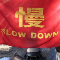 china-slow-down-red-flag-sign13-200x200